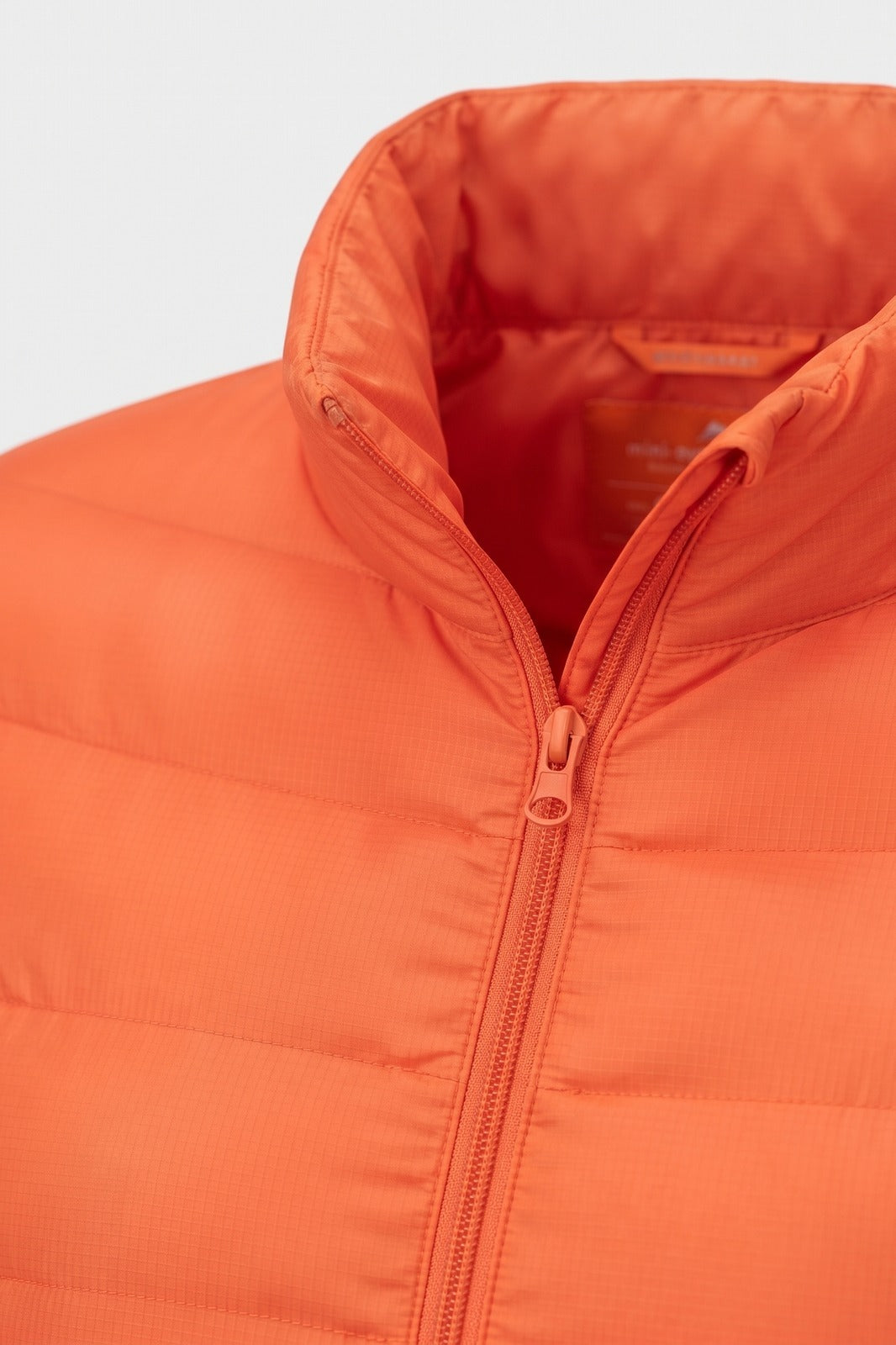 Damen Steppjacke | Schmale Passform — Orange — Detailaufnahme — am Modell
